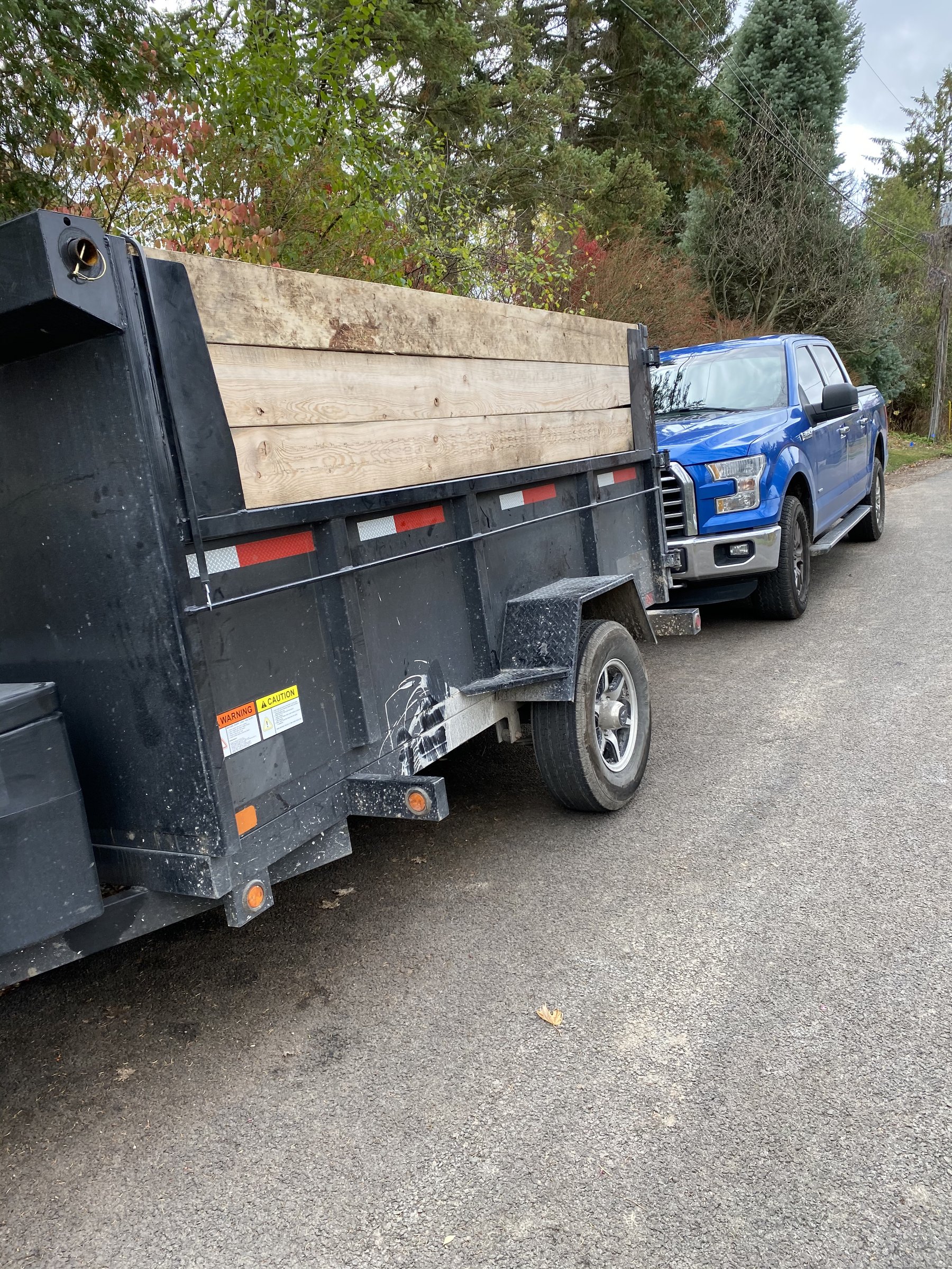 V Rentals dump trailer hooked up to a customer's pickup truck ready to tow in the GTA